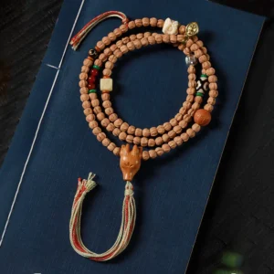 MythStone 108-Bead Bodhi Seed and Red Agate Deer Head Wisdom Mala Bracelet